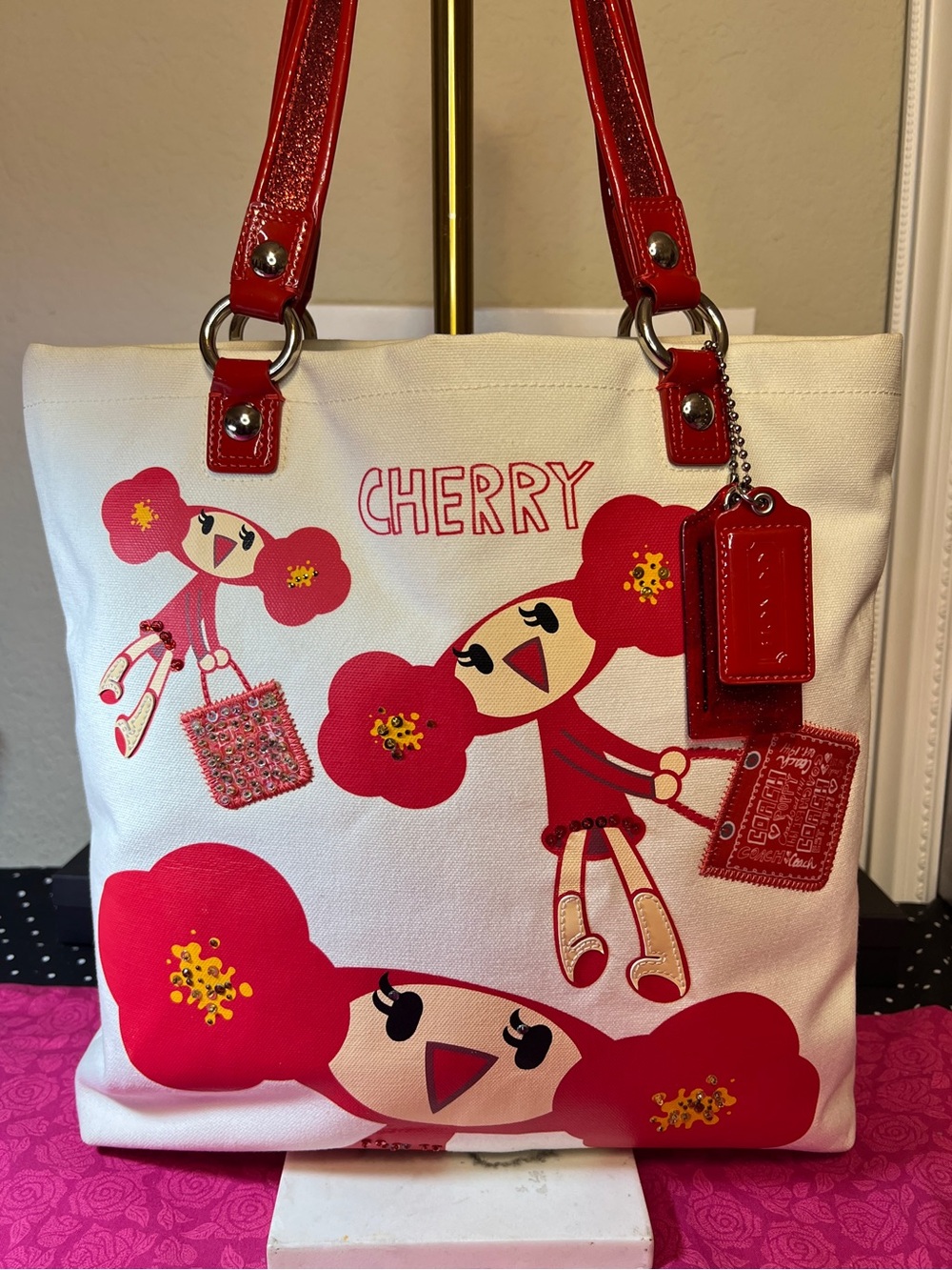 Cherry-Chan Poppy Tote Bag with 2 Red hangtags.